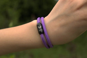 Vertig Magnetic Nautical Paracord Bracelet Purple on a woman. Versatile accessory for expressive style.