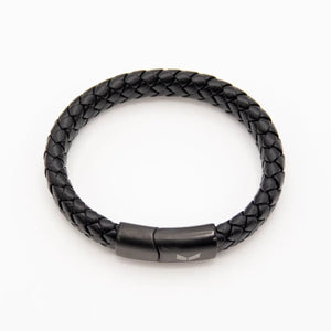 Vertig Magnetic Wide Leather Bracelet Black clasped. Demonstrates the seamless, stylish fit of its magnetic clasp on the wrist.