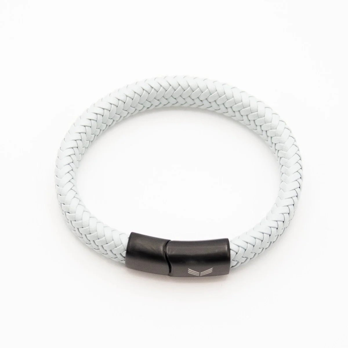 Vertig Magnetic Wide Leather Bracelet Grey clasped. Demonstrates the seamless, stylish fit of its quick-release magnetic clasp on the wrist.