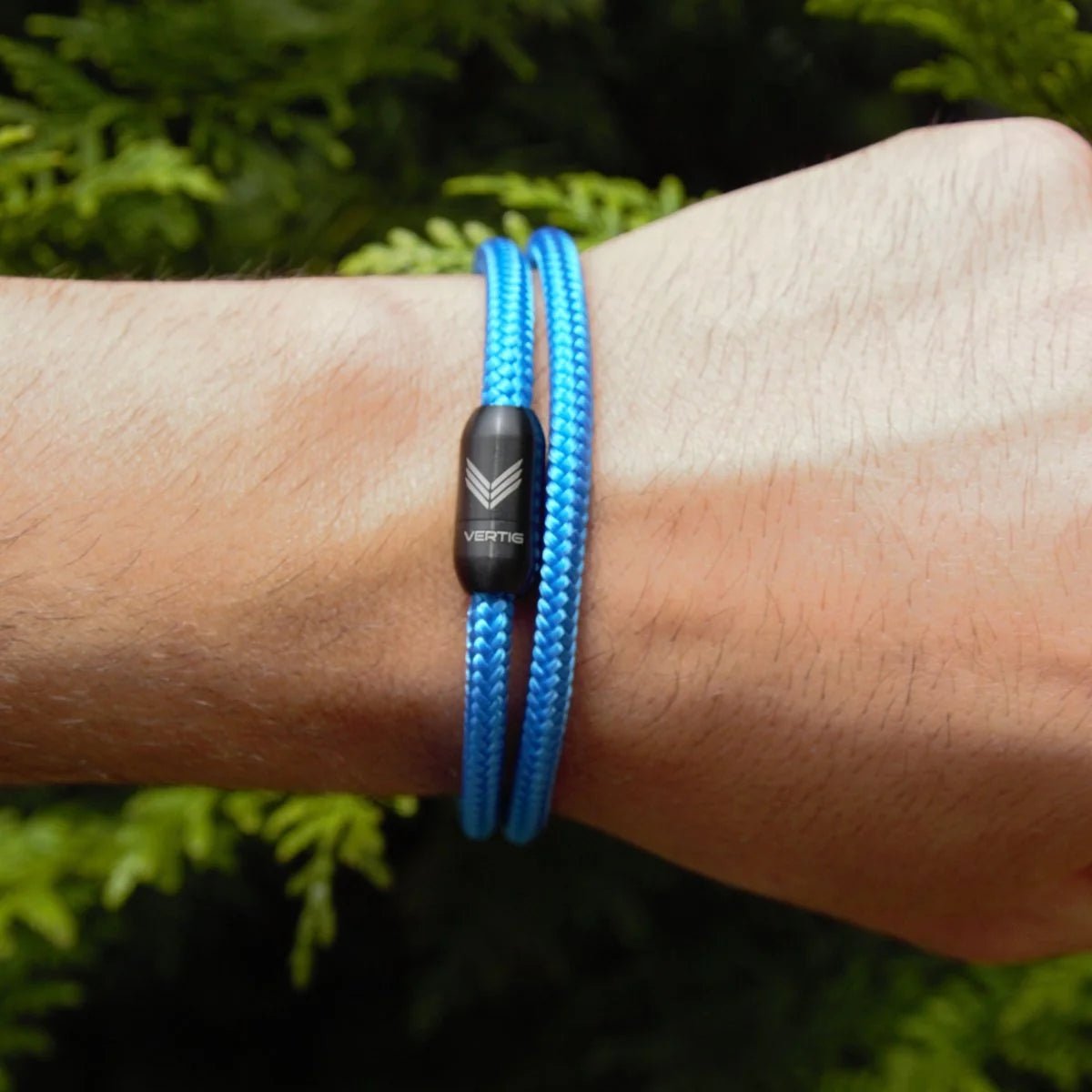 Vertig Magnetic Nautical Paracord Bracelet Blue on a man&#39;s forearm. Durable design, perfect for everyday wear.