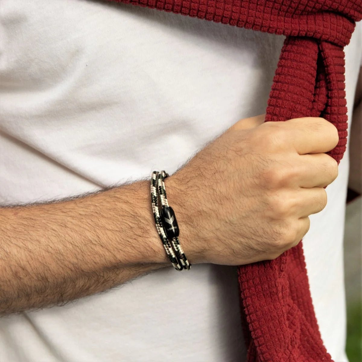 Vertig Magnetic Nautical Paracord Bracelet Camo on a man&#39;s wrist. Adds a bold, outdoor-inspired touch.
