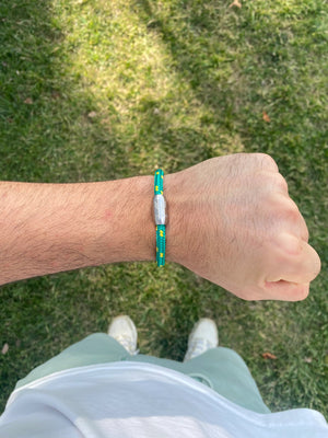 Vertig Magnetic Nautical Paracord Bracelet Green Yellow (Slim) on a man's wrist. Adds a fresh, sporty statement.