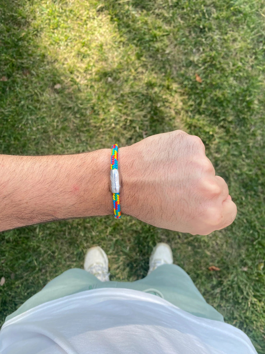 Vertig Magnetic Nautical Paracord Bracelet Multicolor (Slim) on a man&#39;s wrist. Showcases its comfortable, understated appeal.