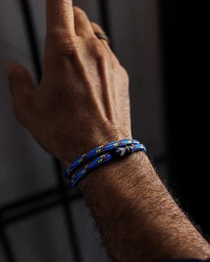 Vertig Magnetic Nautical Paracord Bracelet Multicolor on a man&#39;s wrist. Lightweight, comfortable, and trendy.