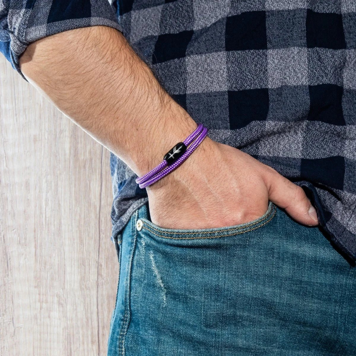 Vertig Magnetic Nautical Paracord Bracelet Purple on a man's wrist. Adds a distinct, elegant statement.