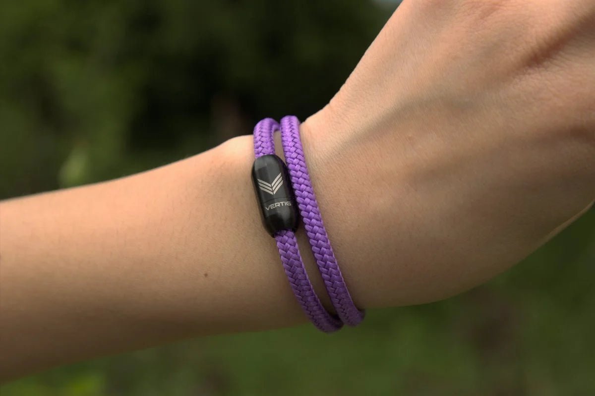 Vertig Magnetic Nautical Paracord Bracelet Purple on a woman. Versatile accessory for expressive style.