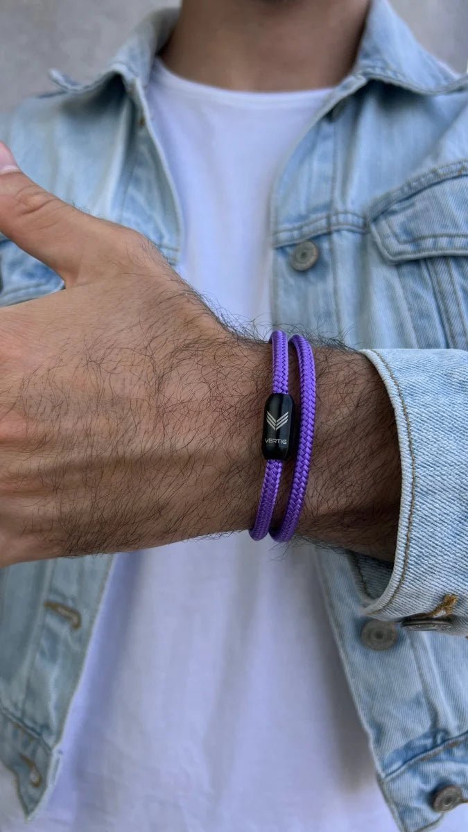 Vertig Magnetic Nautical Paracord Bracelet Purple on a man's forearm. Durable design, perfect for adding color.