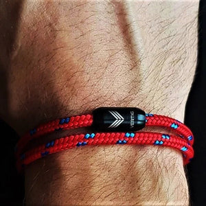 Vertig Magnetic Nautical Paracord Bracelet Red Blue on a man's forearm. Perfect for casual wear, water-resistant.
