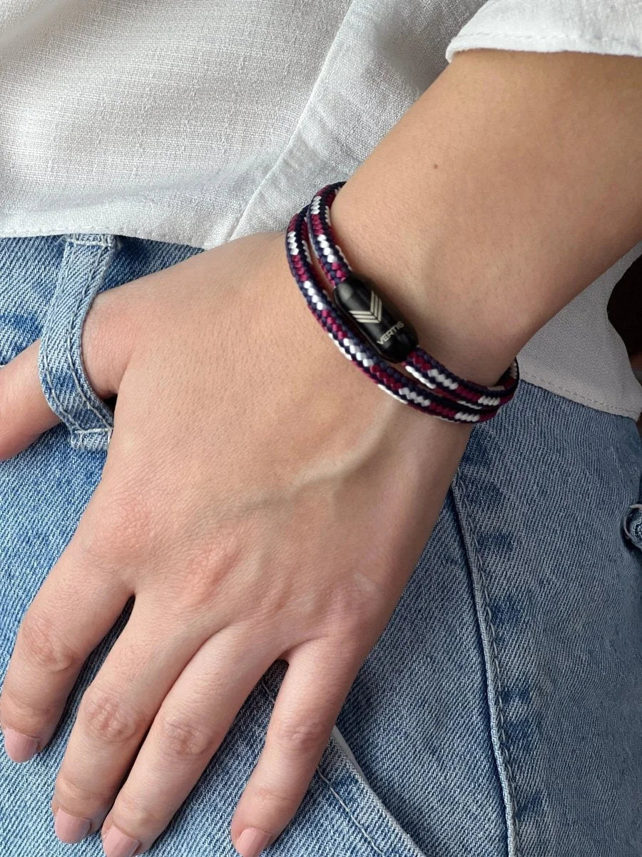 Vertig Magnetic Nautical Paracord Bracelet Red White on a woman&#39;s wrist. A striking accessory for a nautical look.
