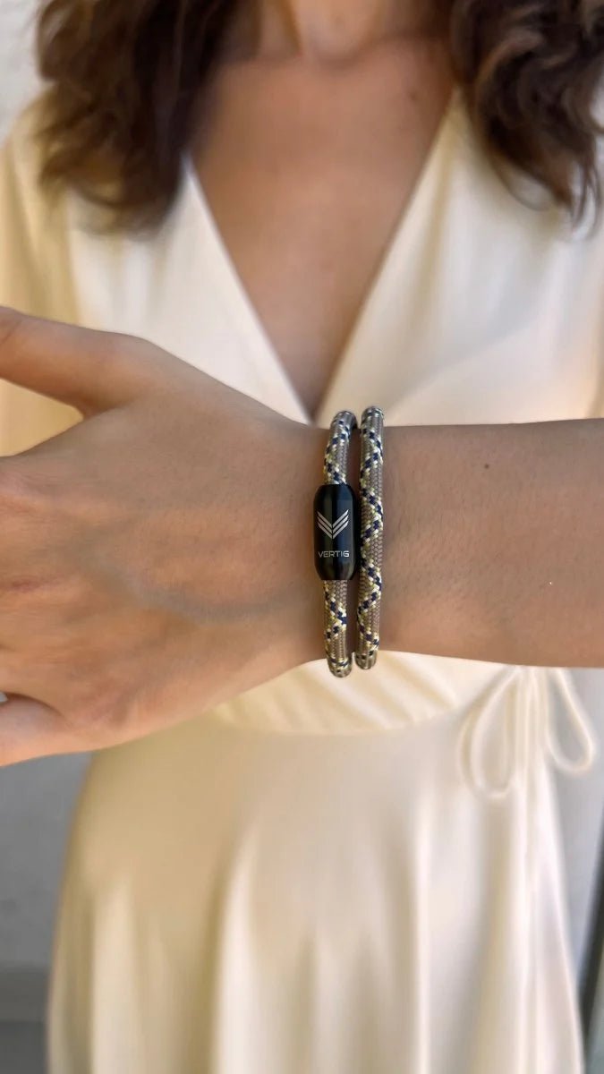 Vertig Magnetic Nautical Paracord Bracelet Snake on a woman&#39;s wrist. Stylish, durable outdoor accessory.