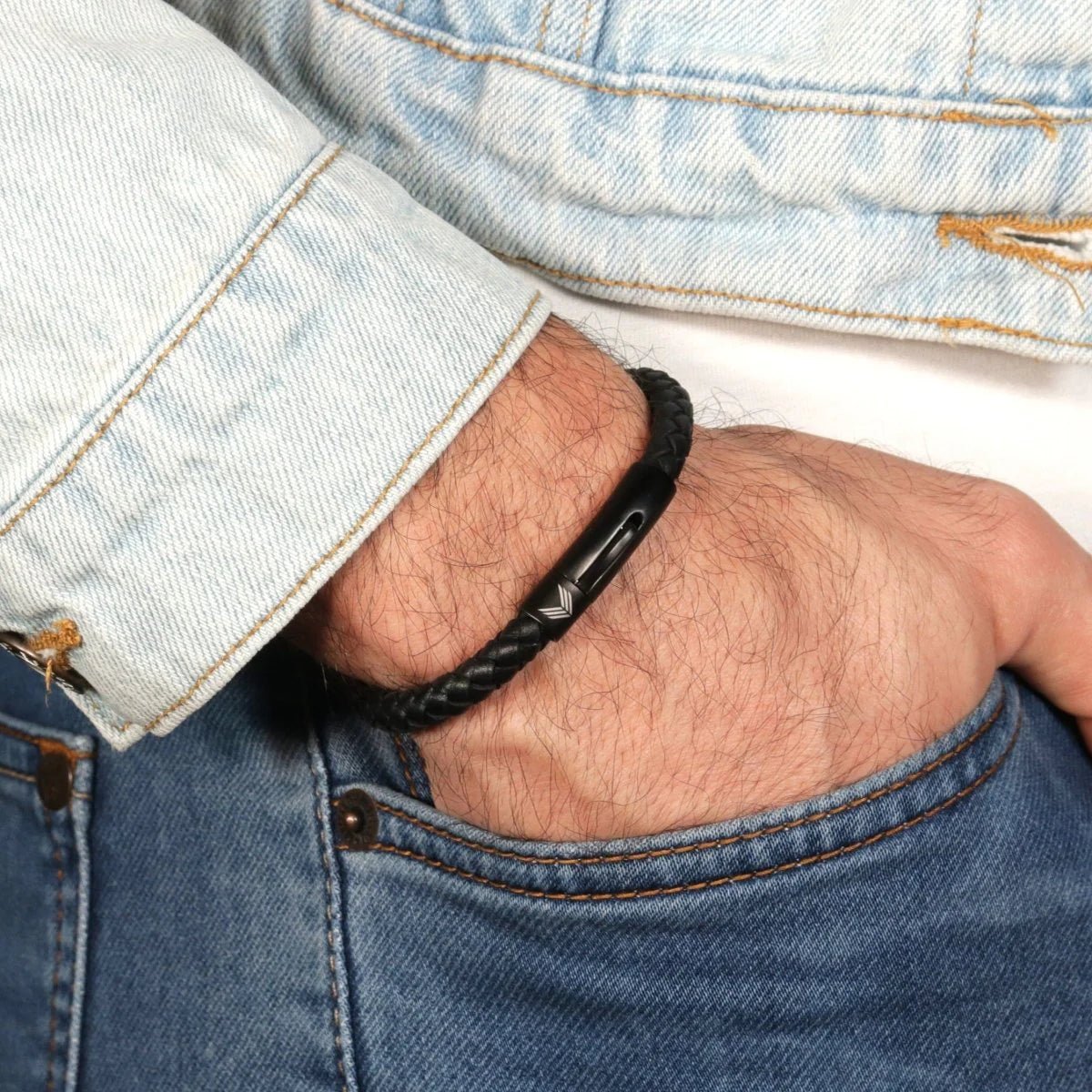 Vertig Leather Bracelet Black on a man. A subtle yet powerful accessory, offering sleek appeal for any occasion.
