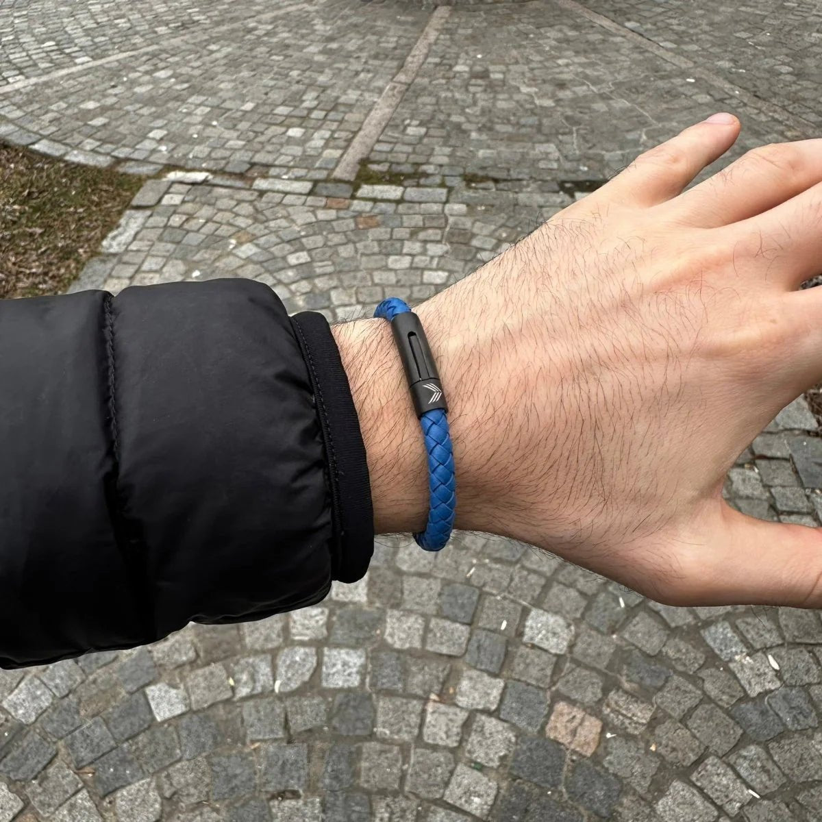 Vertig Leather Bracelet Blue on a man&#39;s forearm. Highlights the supple texture of genuine blue leather, perfect for everyday wear.