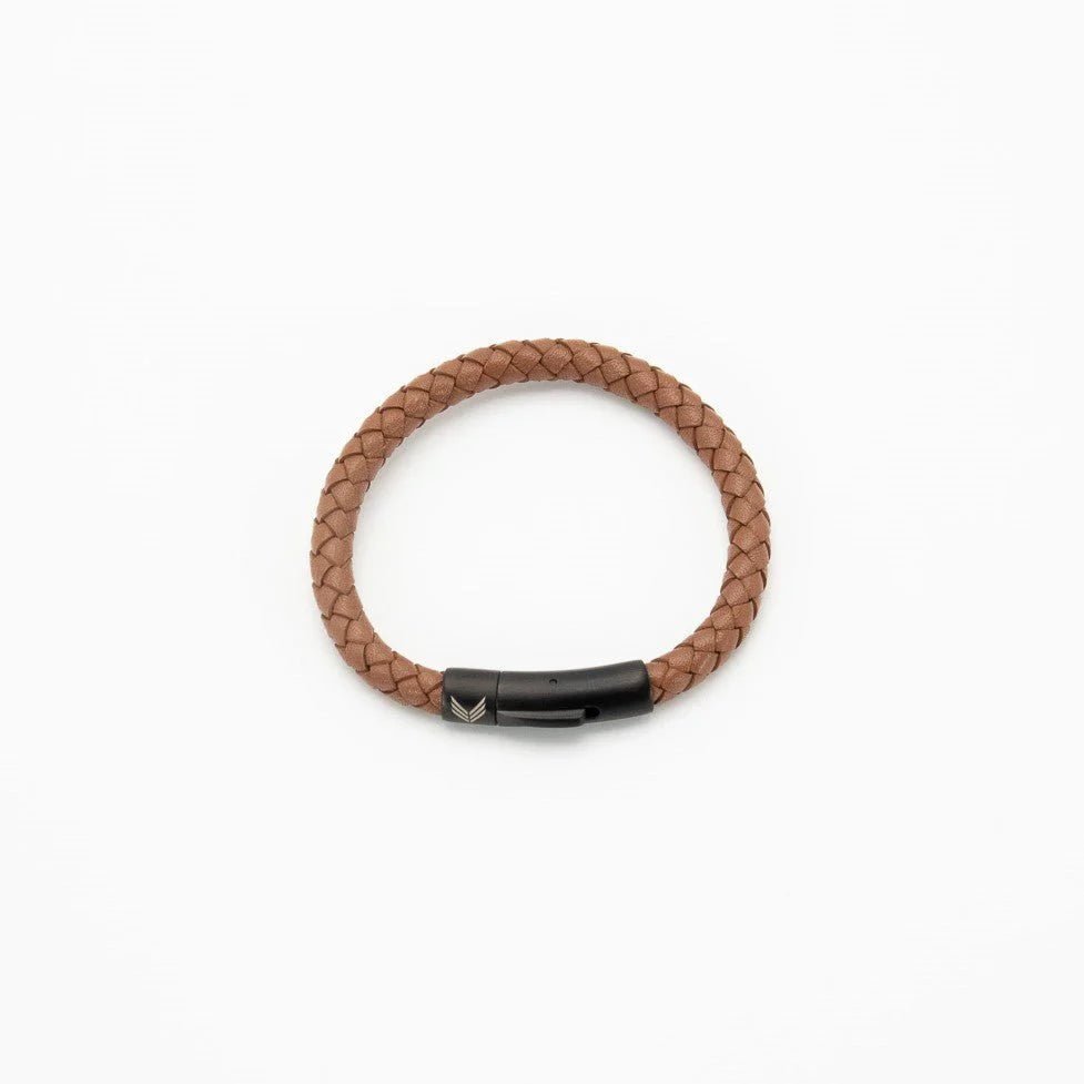 Vertig Magnetic Wide Leather Bracelet Brown clasped. Demonstrates the seamless, stylish fit of its quick-release magnetic clasp on the wrist.