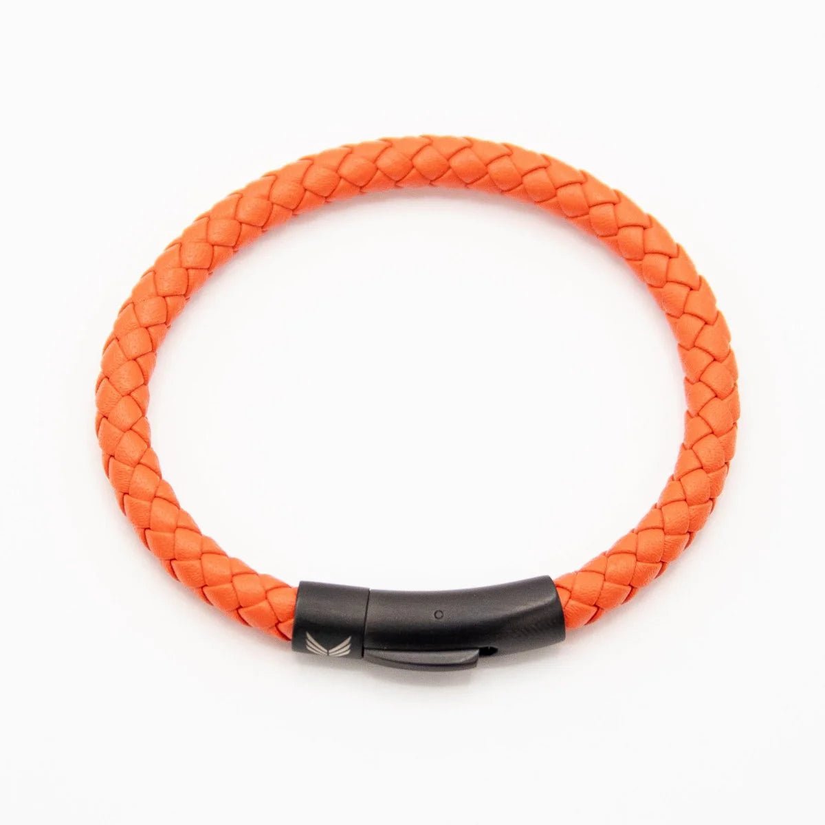 Vertig Leather Bracelet Orange clasped. Demonstrates the seamless and elegant fit of its sleek clasp on the wrist.
