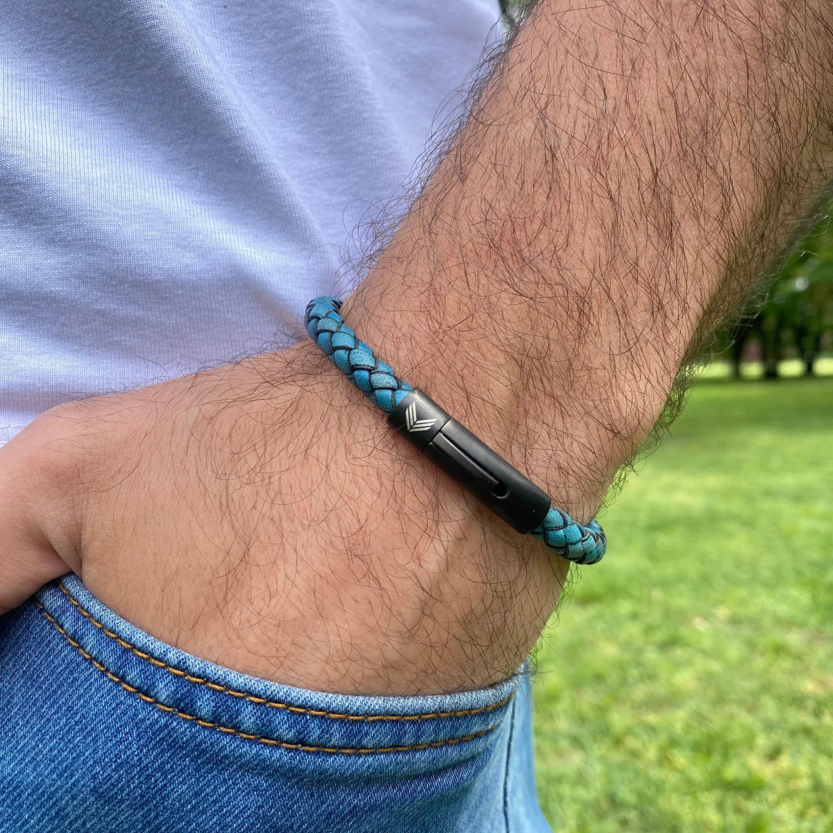 Vertig Leather Bracelet Vintage Blue on a man&#39;s forearm. Showcases the premium texture of this genuine leather, perfect for adding character.