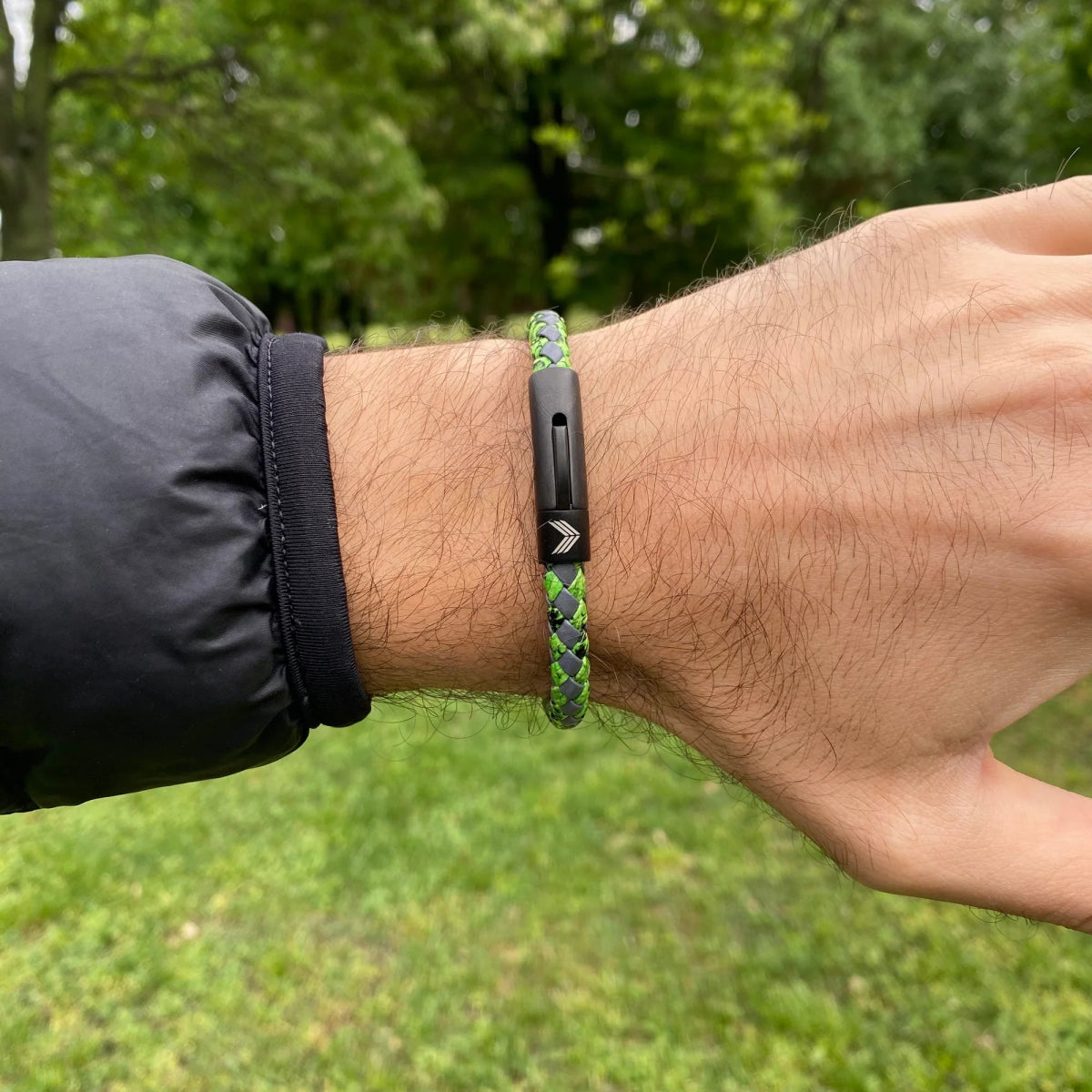 Vertig Leather Bracelet Vintage Green on a man's forearm. Showcases the premium texture of this genuine leather, perfect for an adventurous spirit.