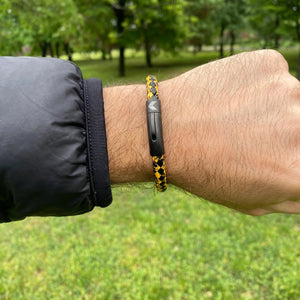 Vertig Leather Bracelet Vintage Yellow on a man's forearm. Showcases the premium texture of this genuine leather, adding unique character.
