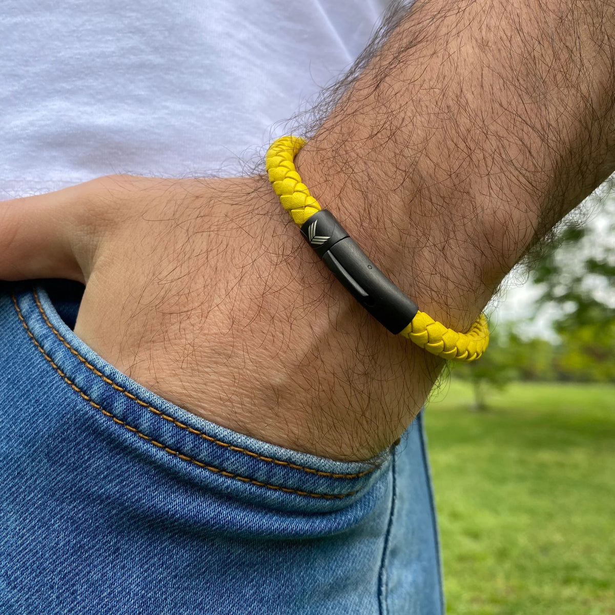 Vertig Leather Bracelet Yellow on a man&#39;s forearm. Highlights the supple texture of genuine yellow leather, perfect for bold statements.