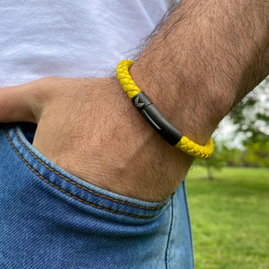 Vertig Leather Bracelet Yellow on a man's forearm. Highlights the supple texture of genuine yellow leather, perfect for bold statements.