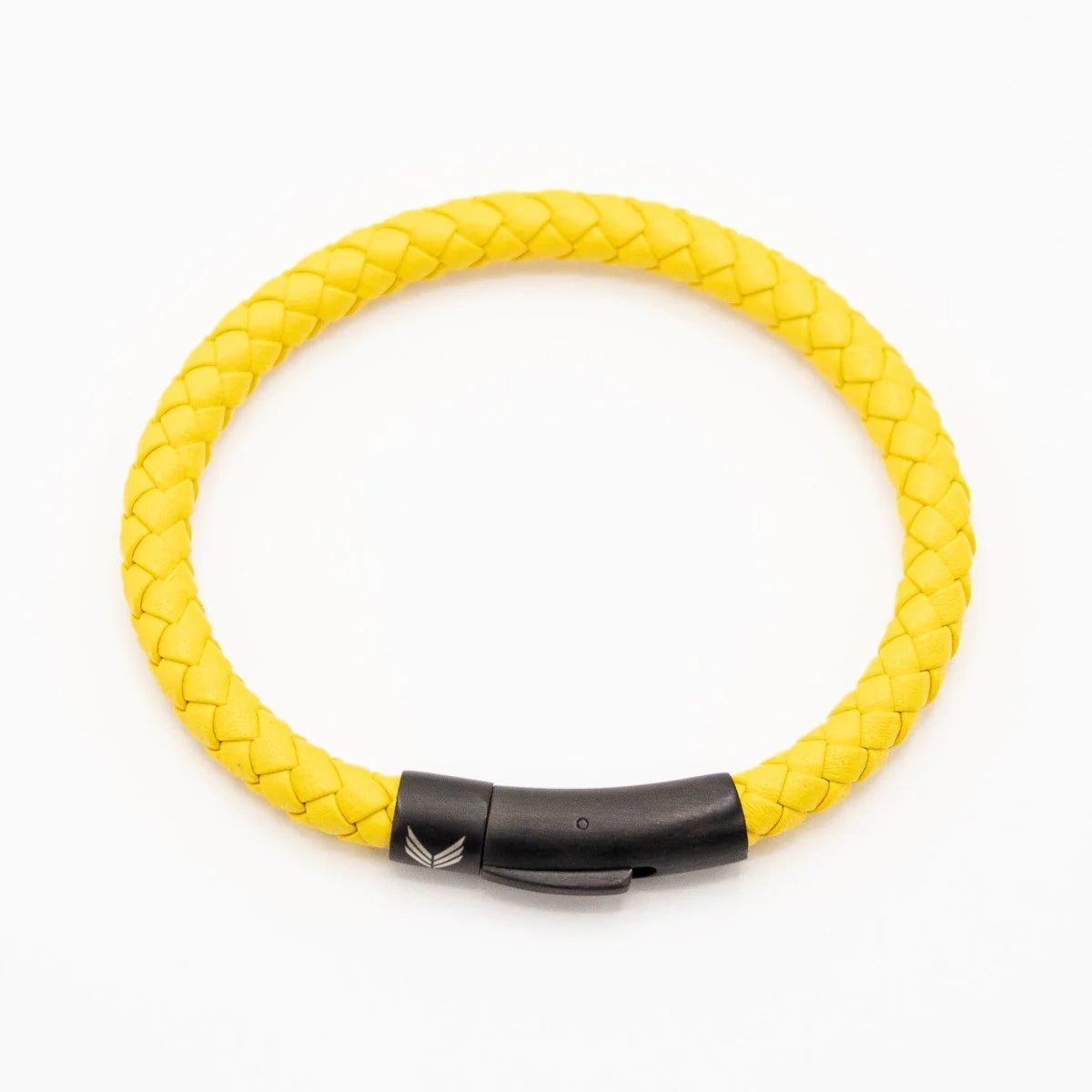 Vertig Leather Bracelet Yellow clasped. Demonstrates the seamless and elegant fit of its sleek clasp on the wrist.