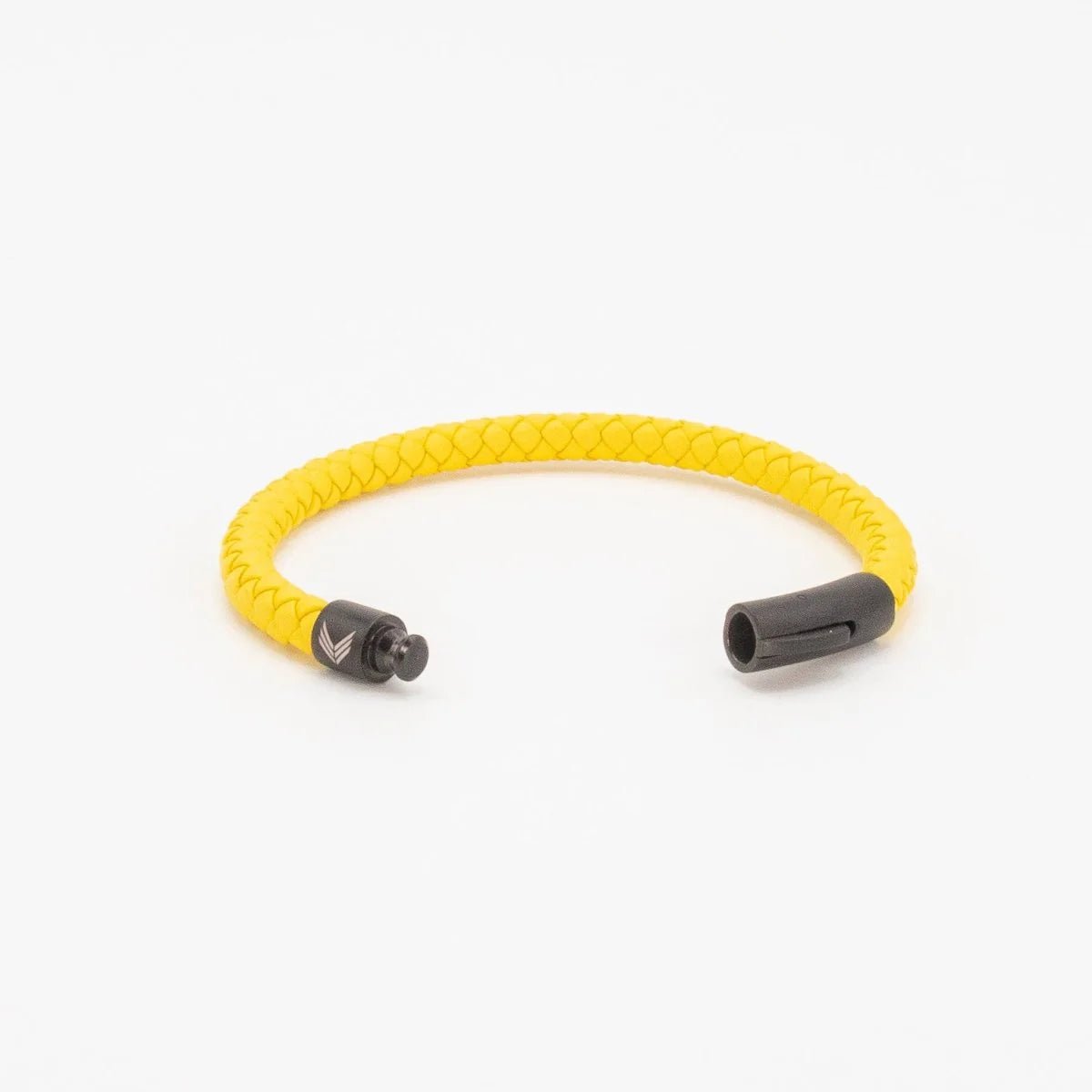 Vertig Leather Bracelet Yellow unclasped. Reveals the smooth, expert craftsmanship of the leather and its robust fastening mechanism.