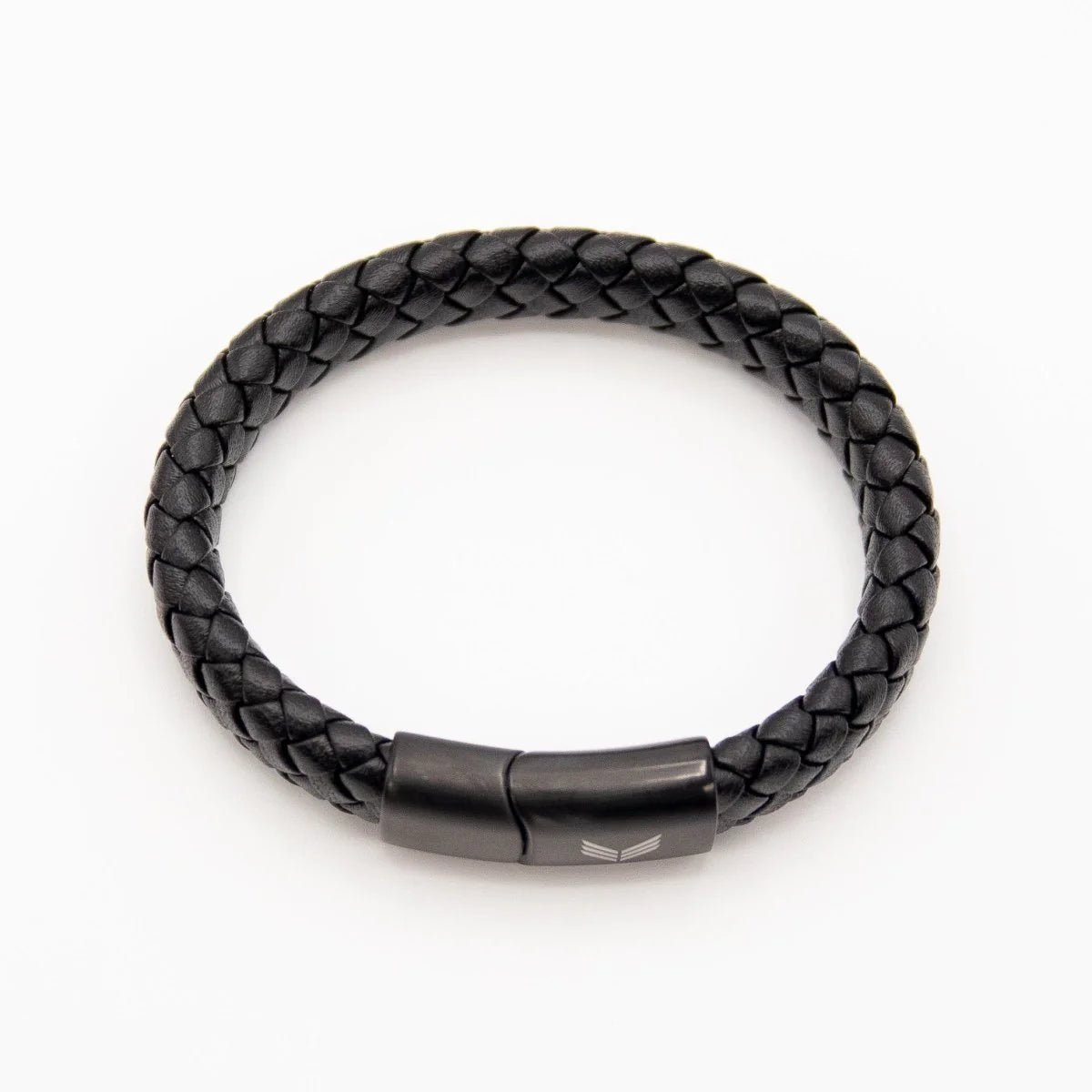 Vertig Magnetic Wide Leather Bracelet Black clasped. Demonstrates the seamless, stylish fit of its magnetic clasp on the wrist.