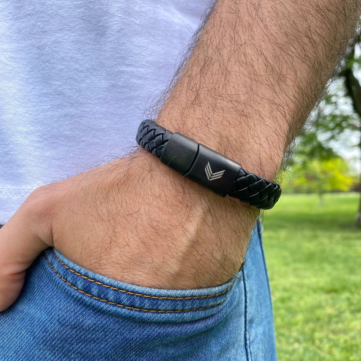 Vertig Magnetic Wide Leather Bracelet Black on a man. An essential accessory for sophisticated casual wear, enhancing any outfit.