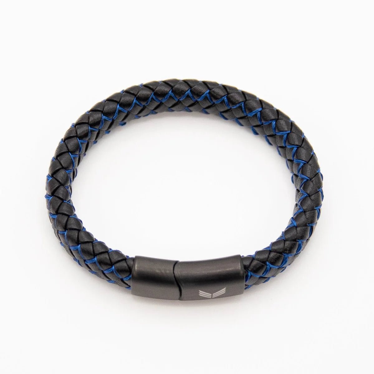 Vertig Magnetic Wide Leather Bracelet Black-Blue clasped. Demonstrates the seamless, stylish fit of its quick-release magnetic clasp on the wrist.
