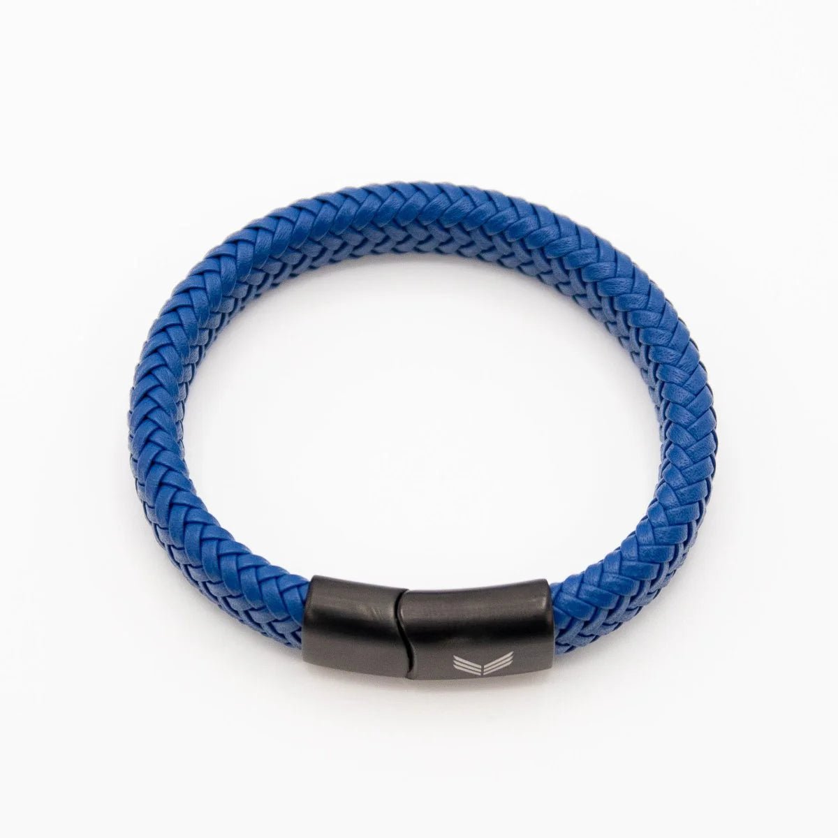 Vertig Magnetic Wide Leather Bracelet Blue clasped. Demonstrates the seamless, stylish fit of its quick-release magnetic clasp on the wrist.