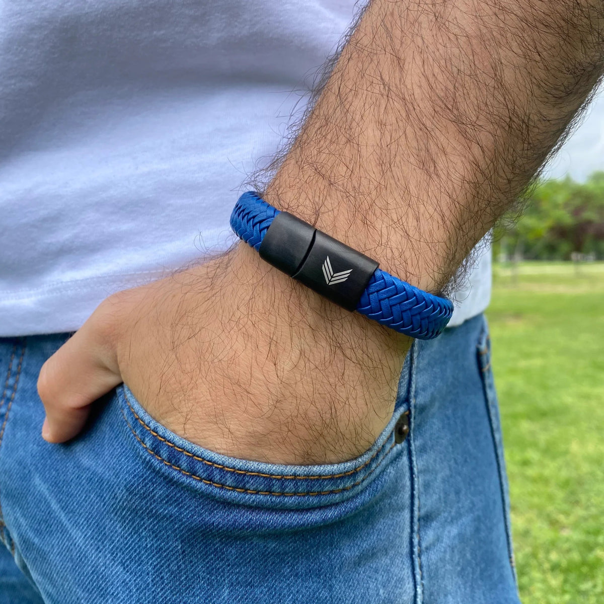 Vertig Magnetic Wide Leather Bracelet Blue on a man. An essential accessory for modern, versatile fashion, adding a touch of class.