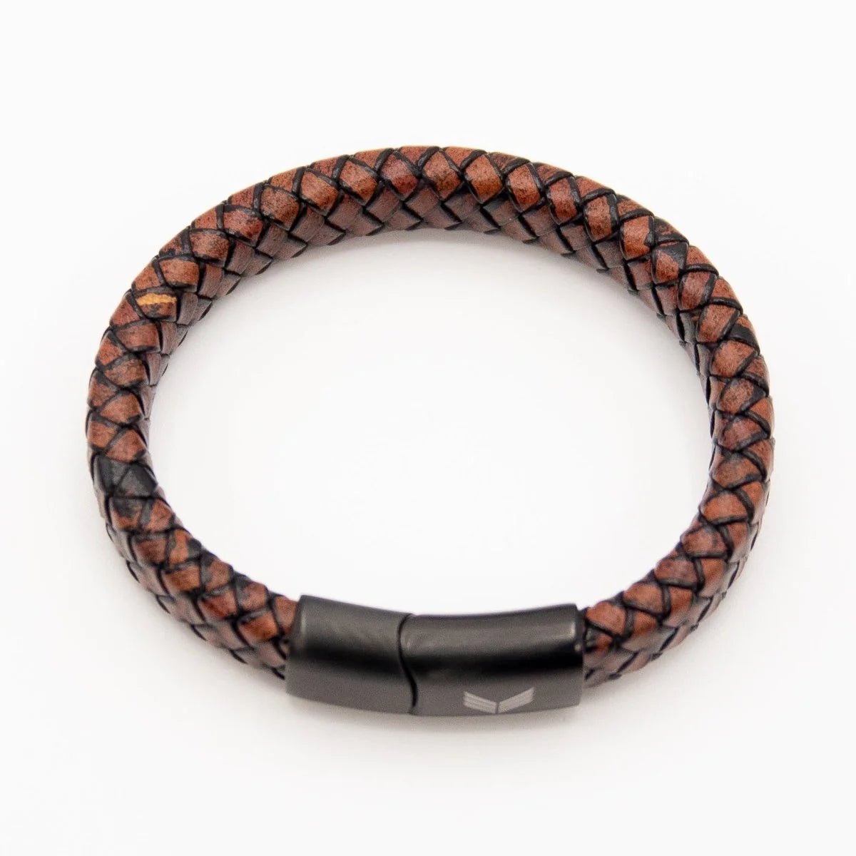 Vertig Magnetic Wide Leather Bracelet Brown clasped. Demonstrates the seamless, stylish fit of its quick-release magnetic clasp on the wrist.