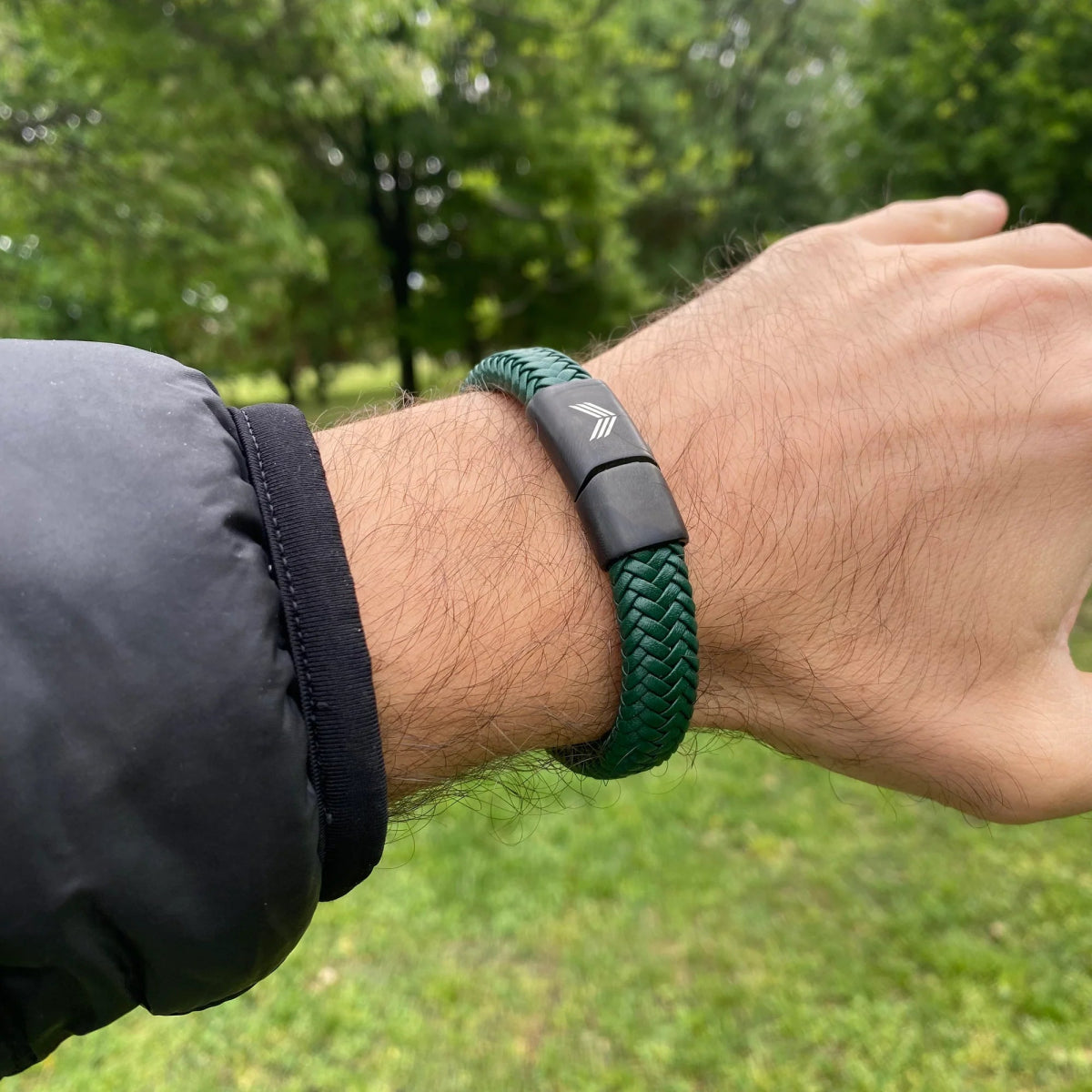 Vertig Magnetic Wide Leather Bracelet Green on a man. An essential accessory for adventurous fashion, adding a touch of nature.