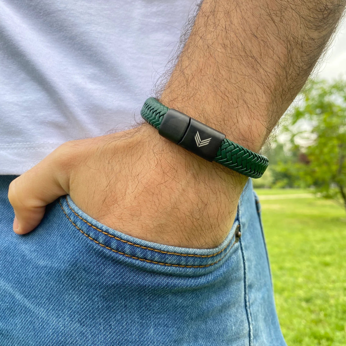 Vertig Magnetic Wide Leather Bracelet Green on a man&#39;s forearm. Showcases the premium texture of genuine green leather and comfortable wear.