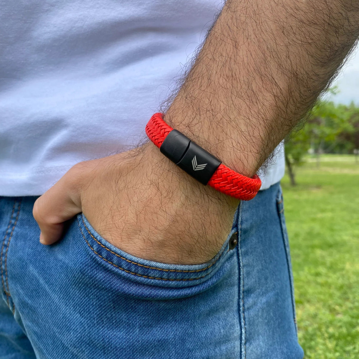 Vertig Magnetic Wide Leather Bracelet Orange on a man. Perfect for making a confident, contemporary fashion statement.